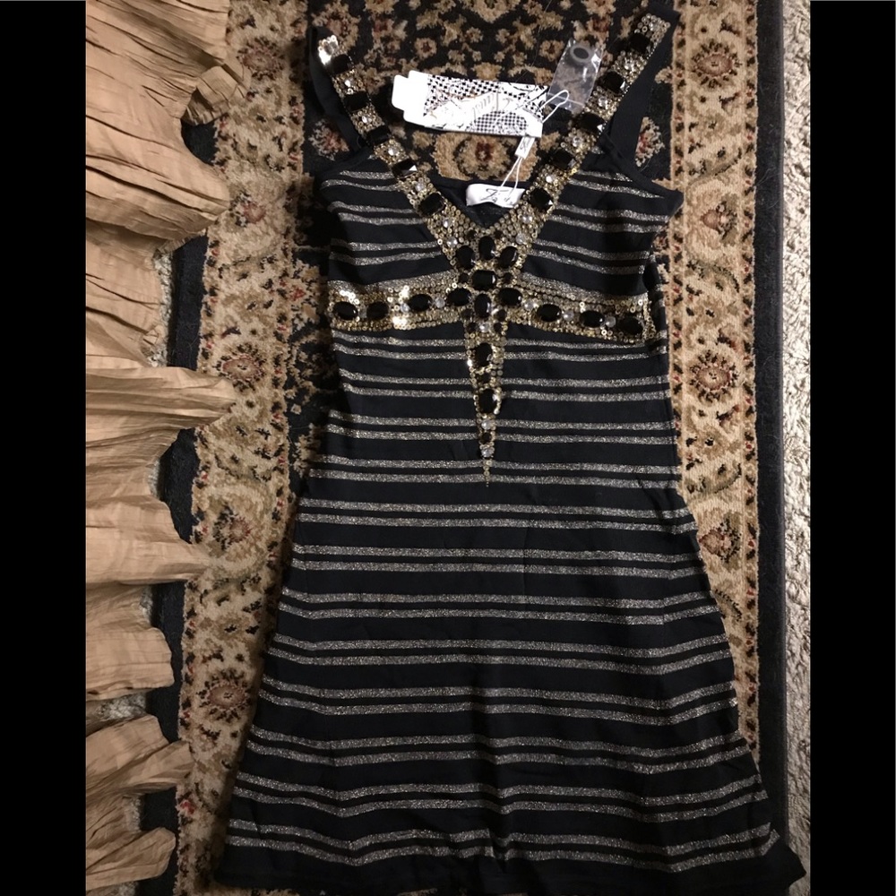 Faust Paris designer knit dress. Size small new
